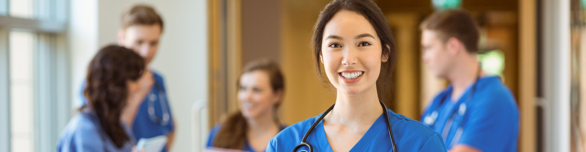 a female nurse smiling